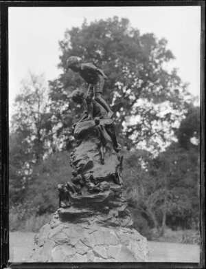 Oamaru Gardens, Otago, view of Wonderland statue of two boys by the sculptor Thomas Clapperton, closeup with fairies around base