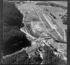Murupara, Whakatane District, Bay of Plenty, showing State Highway 38 and Kopuriki Road with cleared land for timber mill to be built, besides pine forest