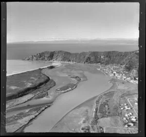 Whakatane, Bay of Plenty, view to Whakatane River mouth with tidal flats and Kohi Point with residential housing, with views to the East cape beyond