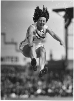 Yvette Williams long jumping at Carisbrook, Dunedin
