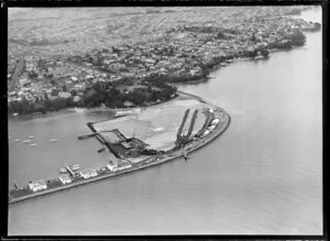 Westhaven, Auckland, showing site preparation for new harbour bridge with Westhaven Marina, looking back to Ponsonby and the city with Curran Street and Shelly Beach Road