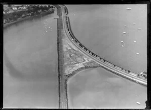 Orakei, Auckland, showing Lieghton Driving School driving track between Tamaki Drive motorway and train track over Hobson Bay, and opposit Point Resolution Park Parnell