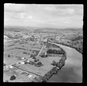 Ngaruawahia, Waikato, view of the Old Taupiri Road through farmland looking south to town at the confluence of the Waikato River and Waipa River