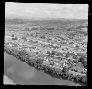 Ngaruawahia, Waikato, view south to town and the Waikato River, showing Great South Road through town and rail yards, with farmland beyond
