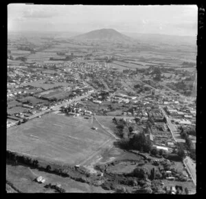 Te Awamutu, Waikato, view over rugby grounds with housing to farmland with Mt Kakepuku beyond