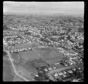 Te Awamutu College, Waikato, view over playing fields and buildings looking south with North Street, Tawhiao Street and Alexander Street to town centre, with farmland beyond