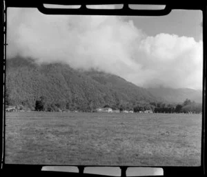 Fox Glacier airstrip, showing houses and grass area