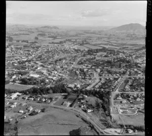 Te Awamutu, Waikato, view west with Ohaupo Road, Mahoe Street and Arawata Street with church and housing, to farmland beyond