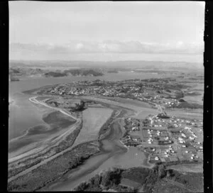 Raglan, Waikato, view of inner Raglan Harbour with Raglan Township Headland, Wainui Stream tidal estuary and bridge, Raglan Airport foreground