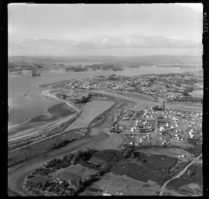 Raglan, Waikato, view of inner Raglan Harbour with Raglan Township Headland, Wainui Stream tidal estuary and bridge, Raglan Airport foreground
