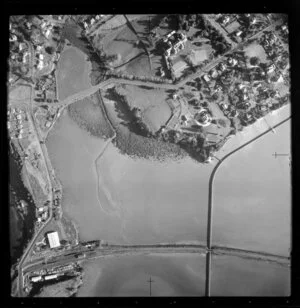 Hobson Bay, Auckland, view over rail bridge with Orakei Station and Orakei Road and Shore Road, and Hobson Bay sewer pipeline