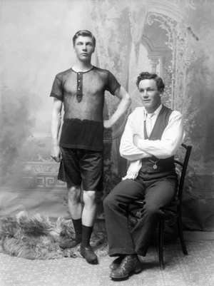 Man in running clothes, possibly with his coach