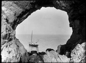 Looking through the archway on Somes Island, with the yacht Rewa in the background, 1890