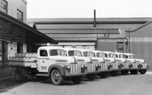 Barker, Frank G, fl 1920s-1950s :Wellington City Council Milk Department trucks at the Tory Street depot