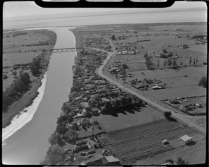 The small town of Clive, south of Napier, with Main Road (State Highway 2) in the foreground over the Clive River, Hawke's Bay Region
