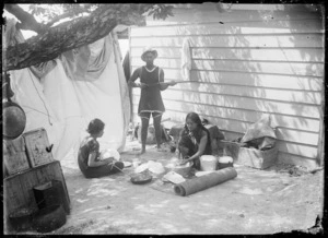 Creator unknown: Photograph of a group camping