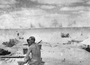 Enemy shells bursting at El Alamein, Egypt, during World War 2 - Photograph taken by J C Pattle