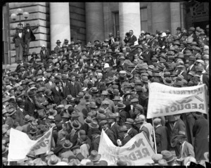 Demonstration of unemployed men, Parliament steps, Wellington, during the 1930s depression