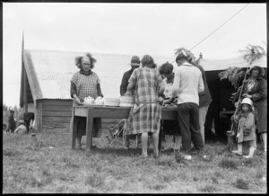 Preparation for serving food at a tangi, Stratford area, Taranaki