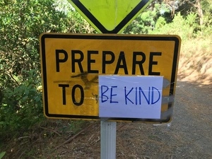 "Prepare To Be Kind" Road Sign