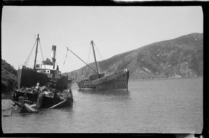 Kaitoa, the Valmarie, and a dredge, at a ship-breakers yard in Whakatahuri, Pelorus Sound, Marlborough
