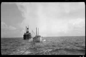 Kaitoa under tow by the Majestic, at a ship-breakers yard in Whakatahuri, Pelorus Sound, Marlborough