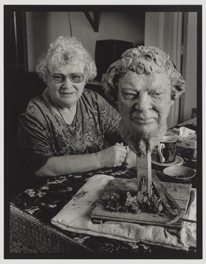 Janet Frame, with her portrait bust made by Anthony Stones
