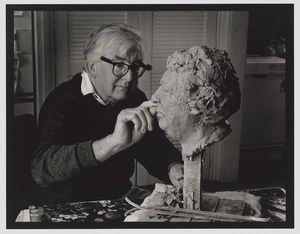 Anthony Stones sculpting clay for portrait bust of Janet Frame