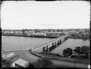 Wanganui, featuring Victoria Bridge, and buildings including Freeman R Jackson's wool and grain store, and The New Zealand Loan and Mercantile Agency Company Ltd