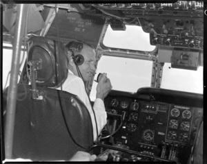 Pan American World Airways, crew member in the cockpit of an aircraft at Whenuapai Airbase, Auckland