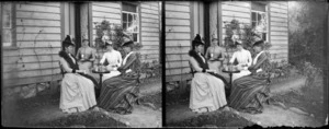 Women having tea outside William and Lydia Williams' Carlyle Street house, Napier, Hawkes Bay Region, including Lydia Myrtle Williams (second from the left)