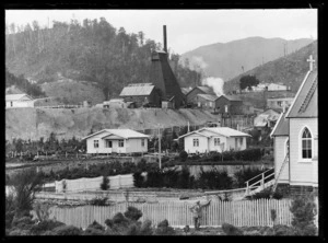 View of Waiuta with Catholic church, staff houses, mine, and mullock heap