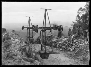 Joseph Divis with pylons and ropeway carrying buckets of ore