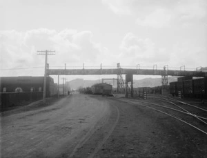 Scene in Wanganui showing an overhead conveyor for coal running over Castlecliff Railway lines