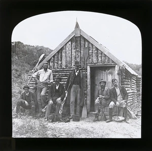 William Williams, and two others, outside a hut