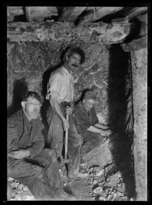 Miners working underground at the face