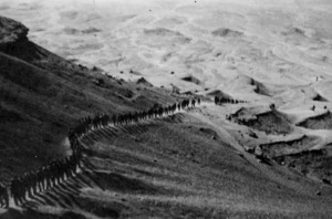 An Egyptian desert showing a line of RMT Coy soldiers, in training