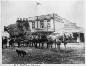 R T Batley's cart and team of horses alongside W J H McCormick's boot emporium, Taihape