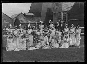 Queen carnival group posed outside mine buildings in November 1931