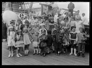 Children in fancy dress at party on board ship