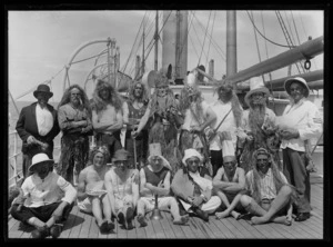 Group portrait of passengers in costume involved with "Crossing the line" ceremony near Panama