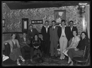 Group portrait in boarding house drawing room