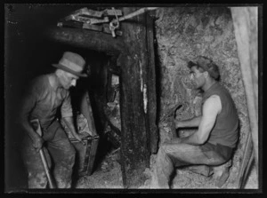 Portrait of two men underground in Blackwater mine