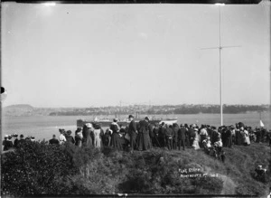 Crowd gathered round the flagstaff at Northcote, Auckland