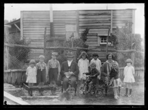 Jones family outside their house in Waiuta