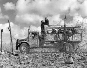 Army truck going through the Italian frontier wire at the opening of the 2nd Libyan Campaign