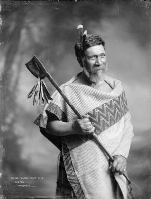 Unidentified Maori chief holding a tewhatewha