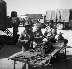 Soldiers of New Zealand ASC workshops undertake repairs of 2 Division transport at Maadi camp after the Tunisian Campaign.