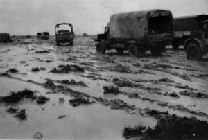 Army trucks of the 4th Reserve Mechanical Transport, in muddy conditions, south of Daba, Egypt