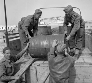 New Zealand soldiers loading a truck with supplies, Tripoli